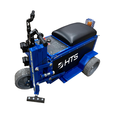 Blue and black motorized HTS Power Shaver with a padded seat, joystick controls, and a basket on the side, on a transparent background.