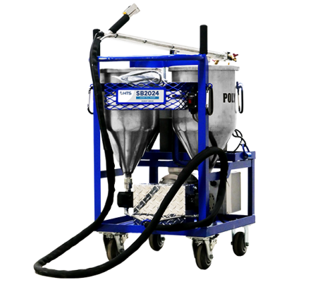 Industrial blasting machine with twin hoppers on a blue frame, equipped with hoses and nozzles, isolated on a white background.